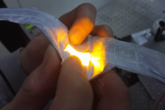 <a href="https://polyopto.wp.st-andrews.ac.uk/research-areas/biophotonics/">Biophotonics</a> <br/>A flexible OLED bandage used in the treatment of skin cancer